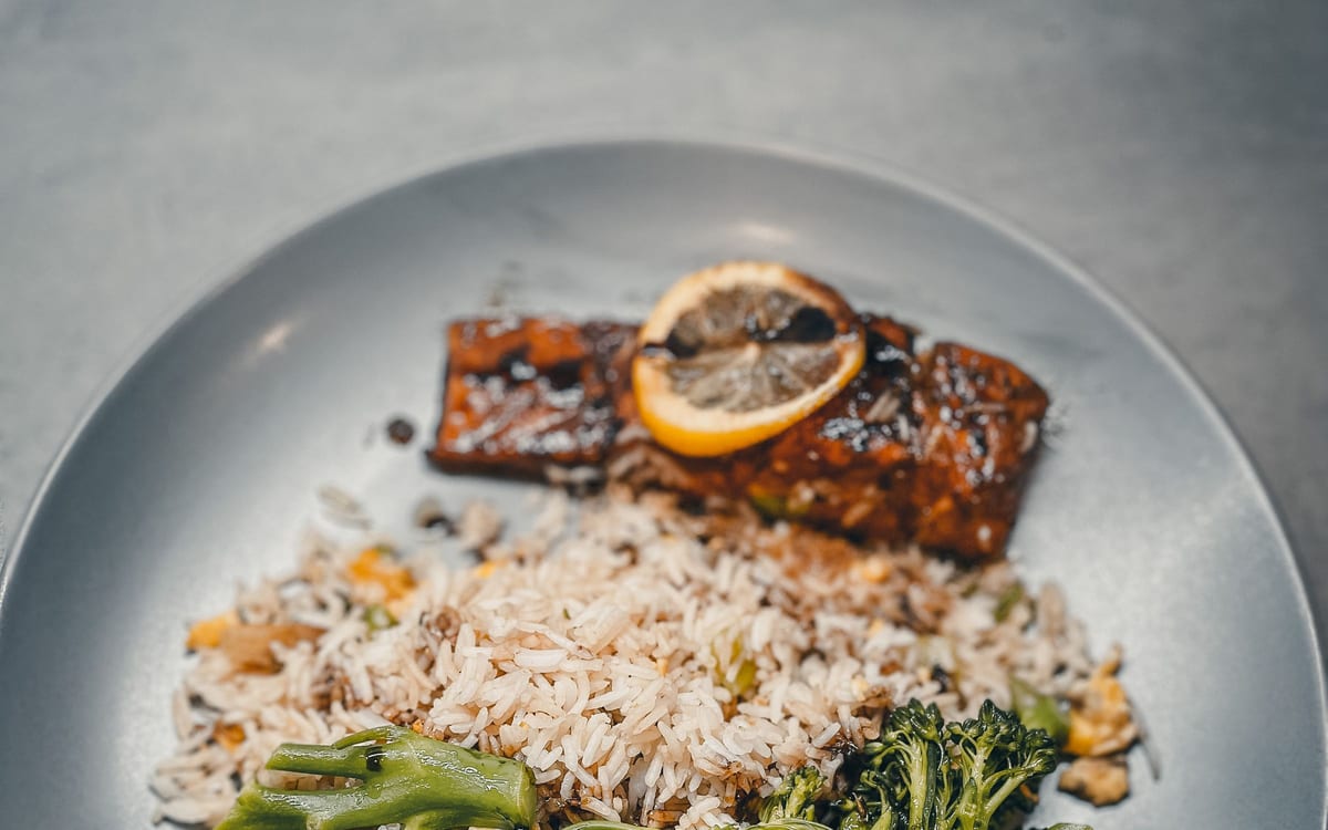 Balanced salmon, rice, and broccoli plate